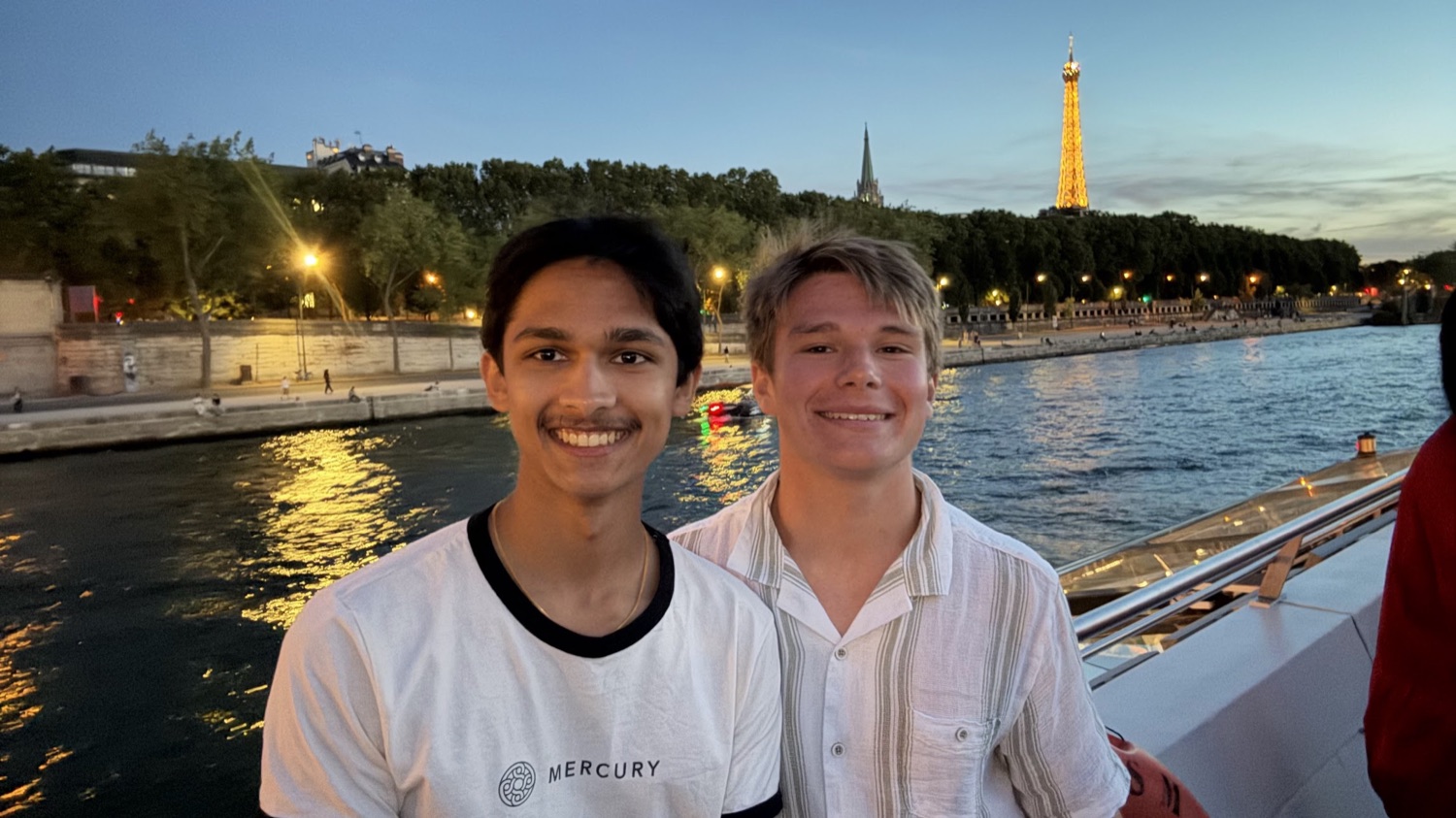 On the Seine at dusk with the Eiffel Tower behind